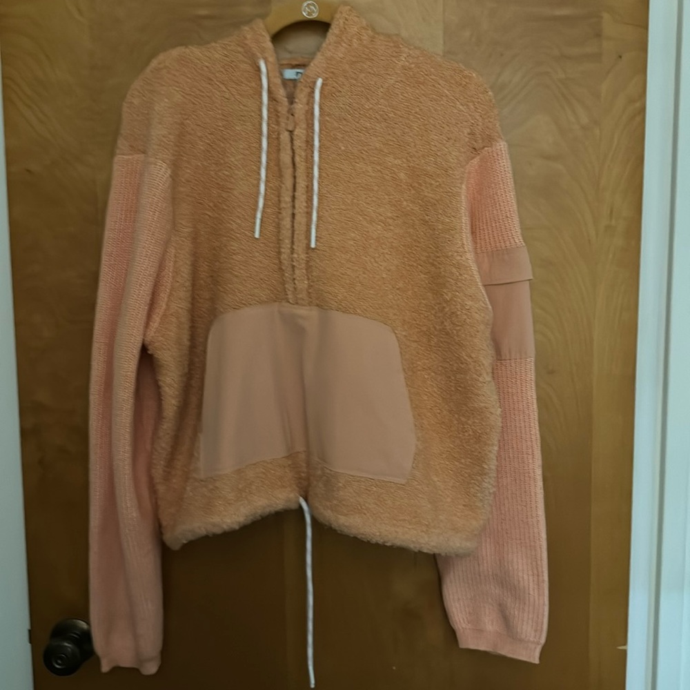 Orange Half zip sweater.